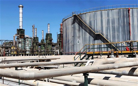 Libya warns oil companies dealing with militias
