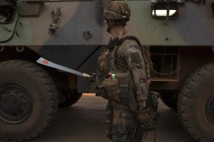 A French peacekeeping soldier holds a confiscated machete in the centre of the capital Bangui