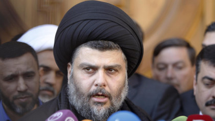 Iraqi Shi'ite cleric Moqtada al-Sadr speaks to the media during a visit to the Our Lady of Salvation Church in Baghdad January 4, 2013.  REUTERS/Thaier Al-Sudani (IRAQ - Tags: RELIGION) - RTR3C3HP