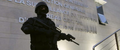 A Moroccan policeman stands guard at the Central Bureau of Judicial Investigation office in Sale