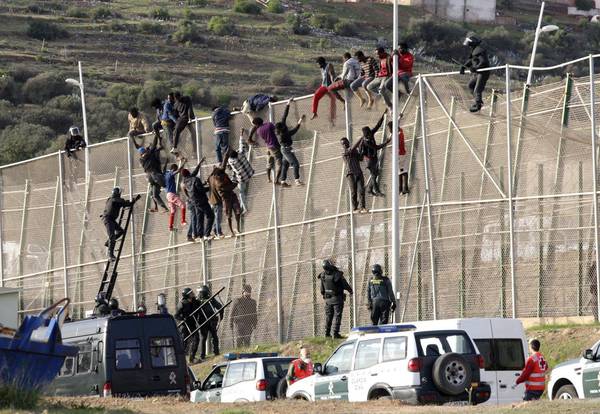 Hundreds of Sub-Saharans Storm Border Fence into Spanish Occupied Ceuta