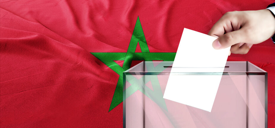 Morocco,Flag,,Morocco,The,Symbol,Of,Elections,Male,Hand,Puts